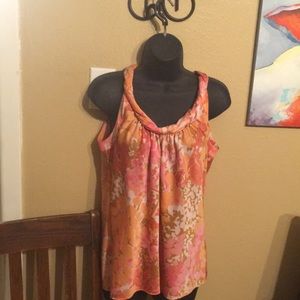 Beautiful silk top! Worms couple times..